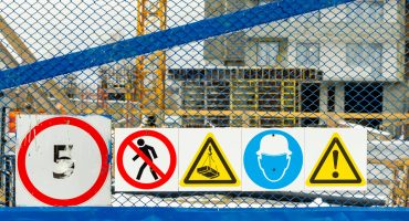 warning-signs-fence-near-construction-site
